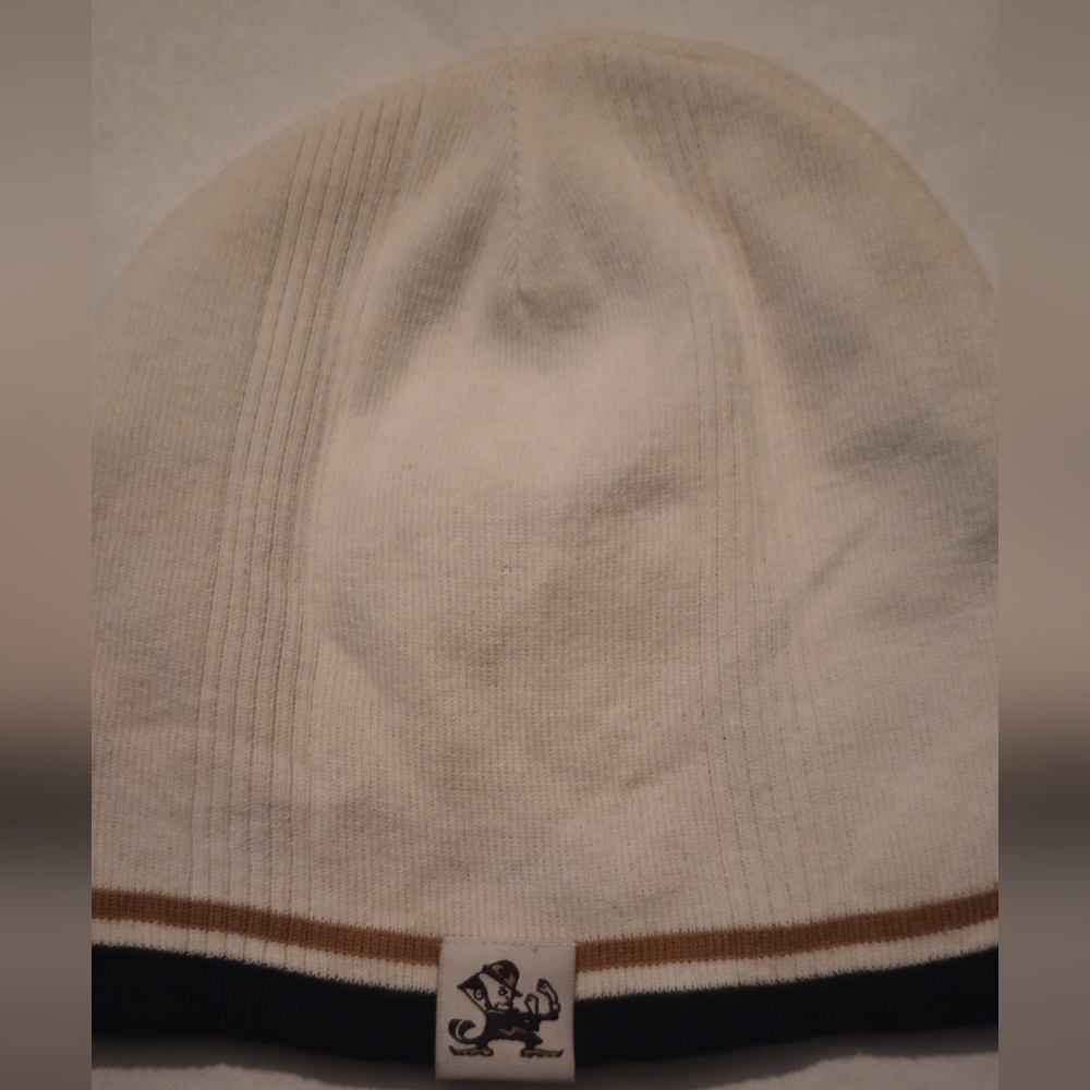 Reversible Notre Dame thin beanie. Hunter green on inside/white on out